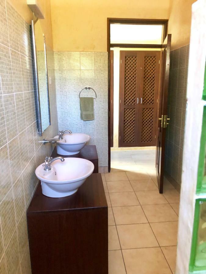 Flametree Beach Homes Praia de Diani Exterior foto