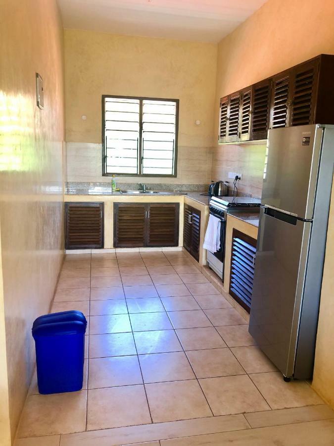 Flametree Beach Homes Praia de Diani Exterior foto