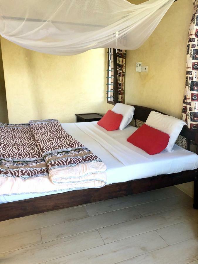 Flametree Beach Homes Praia de Diani Exterior foto