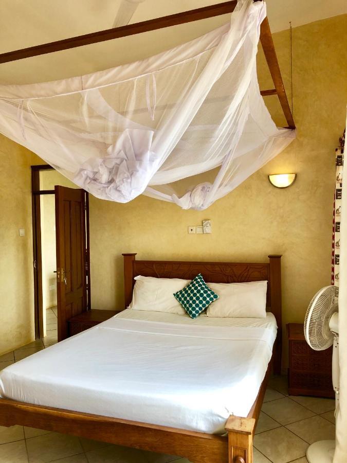 Flametree Beach Homes Praia de Diani Exterior foto