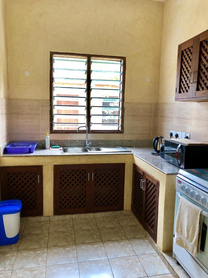Flametree Beach Homes Praia de Diani Exterior foto