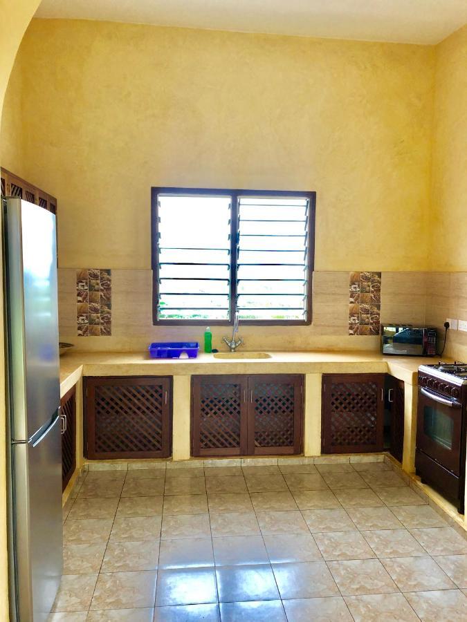 Flametree Beach Homes Praia de Diani Exterior foto