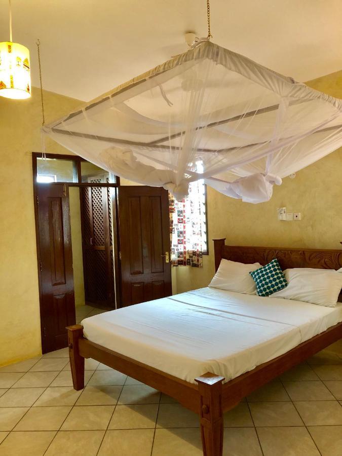 Flametree Beach Homes Praia de Diani Exterior foto