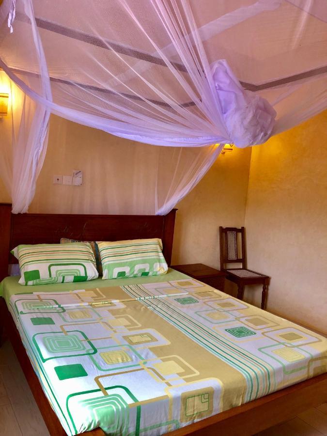 Flametree Beach Homes Praia de Diani Exterior foto
