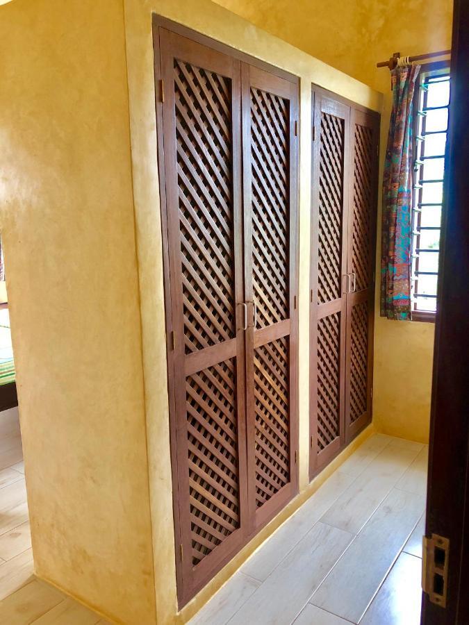 Flametree Beach Homes Praia de Diani Exterior foto